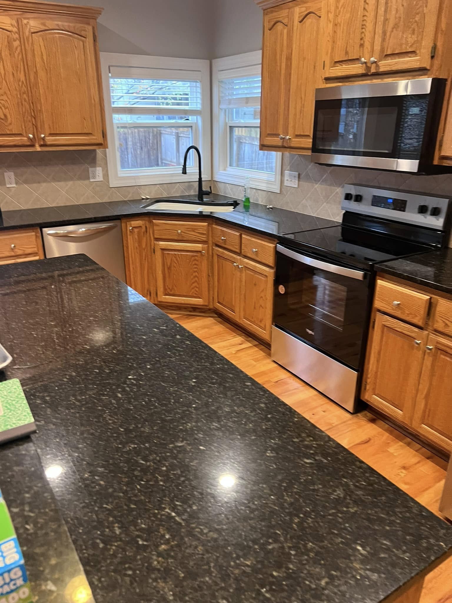 Cleaned bathroom with glass shower — Queens of Clean KC
